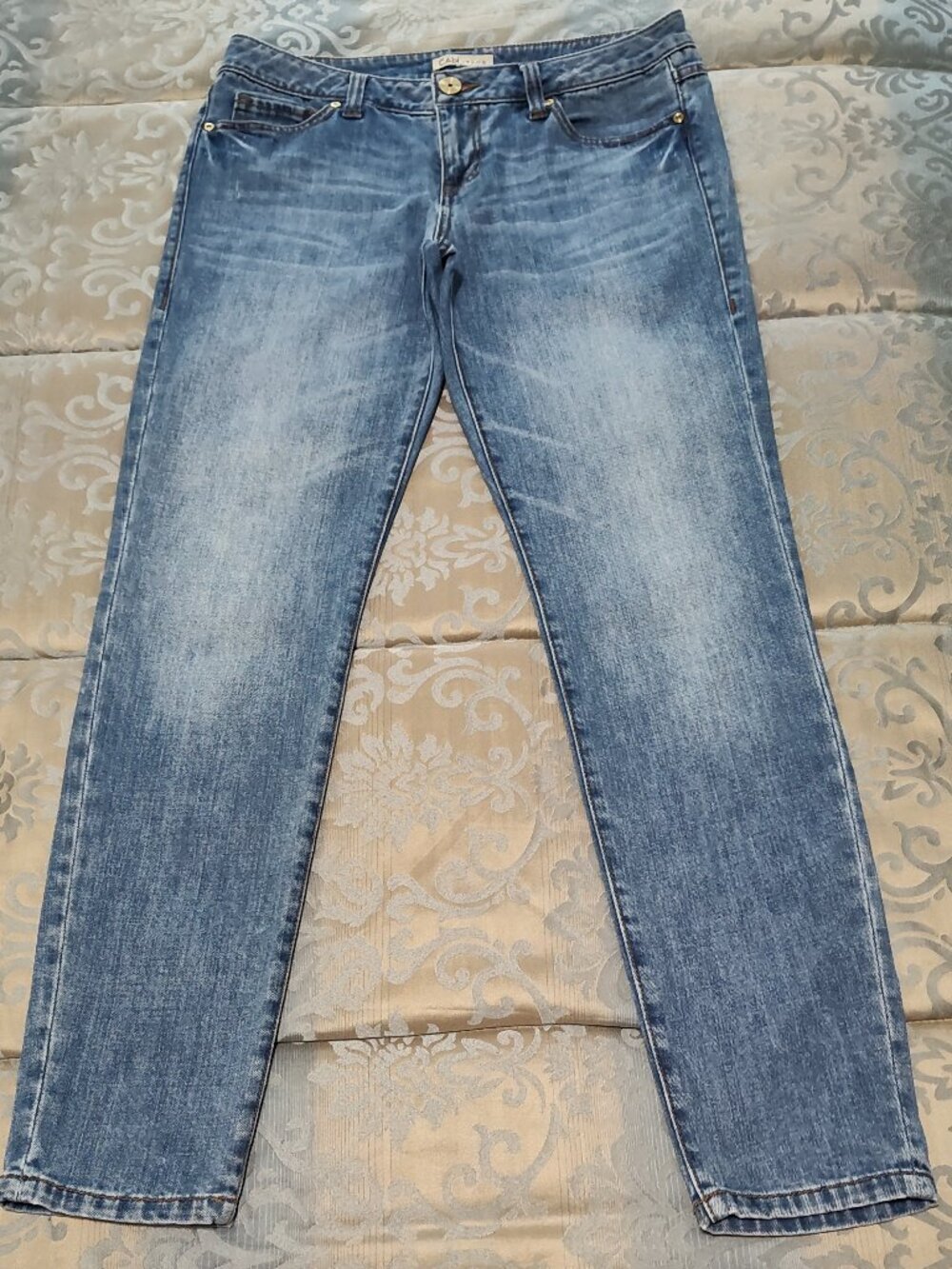 Cabi light to medium wash blue jeans, VG used condition, size 8